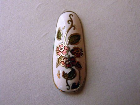 Fingernagel in Metall